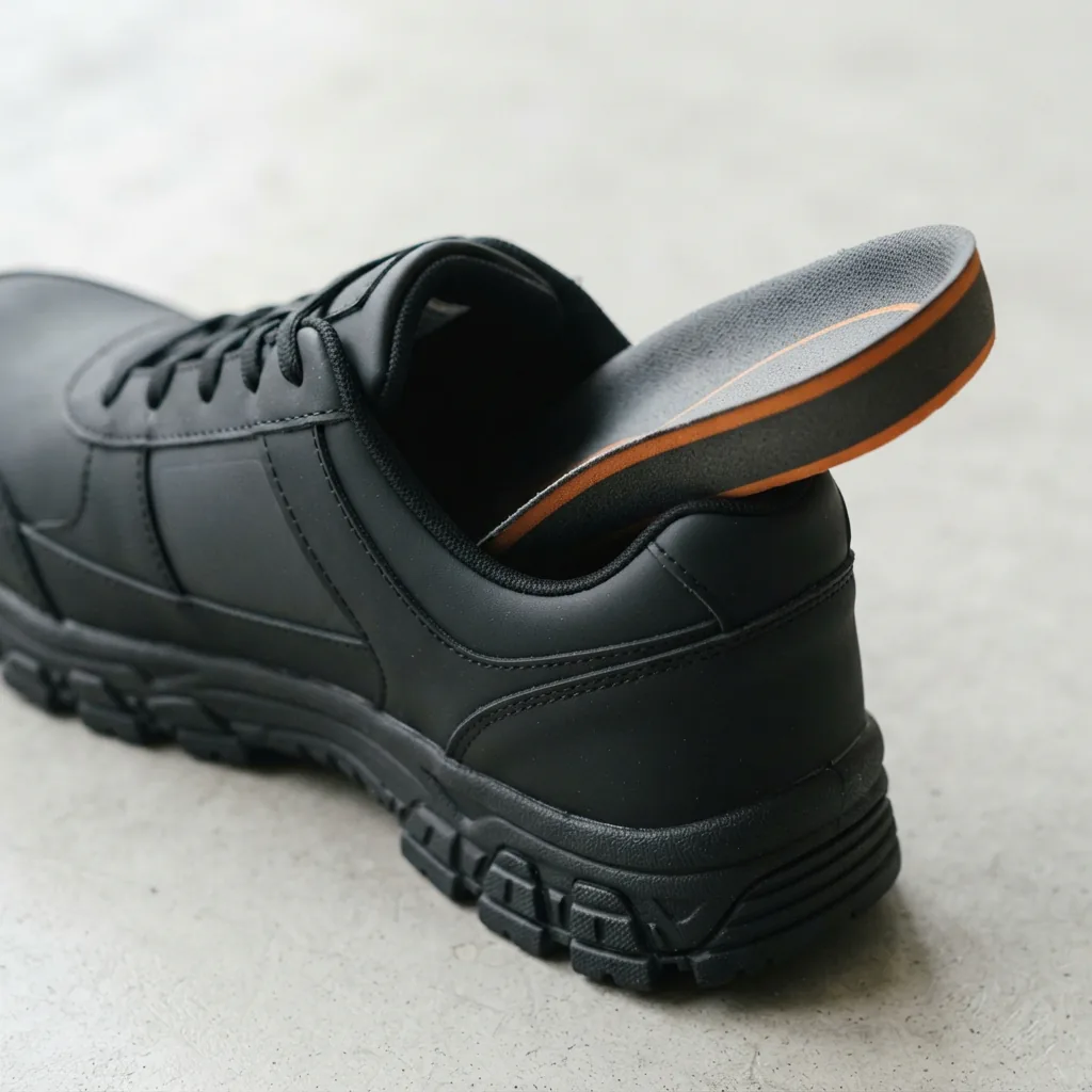 Close-up of a cushioned insole inside a professional kitchen shoe.